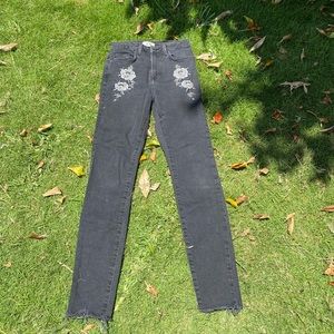 Black floral patch pants